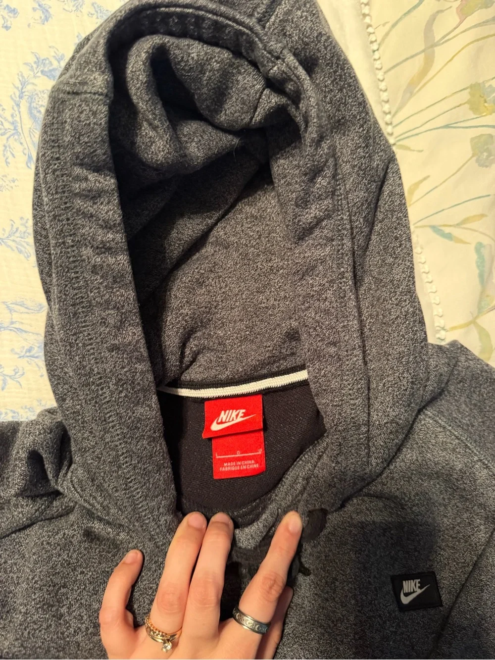 Nike Sportswear Heathered Knit Pullover Hoodie.
